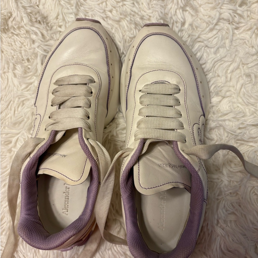 Alexander McQueen Women's white Sneakers with lavender Trim.